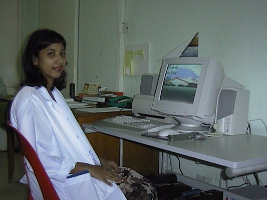 Dr. Sheena at her hightech computer table